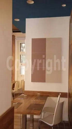 Esempio reale di insonorizzazione elegante in un ristorante grazie ai pannelli fonoassorbenti<br /><br />