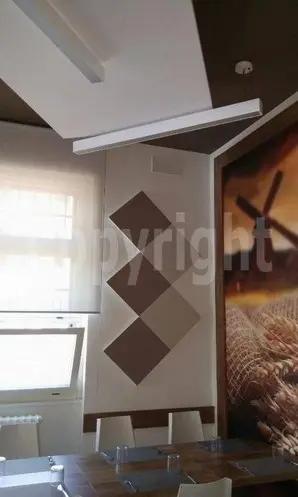 Correzione acustica su misura con quadrotti fonoassorbenti dal design moderno<br /><br />